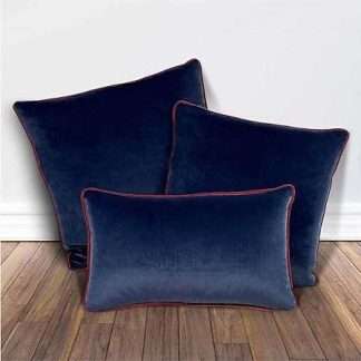 Set of 3 cushions made of soft velvet, in navy blue and maroon edge. With pipe edge