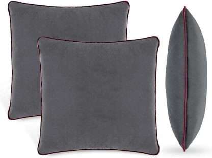 Set of 2 cushions made of soft velvet, in navy blue and maroon edge. With pipe type edge. Size 50x50cm