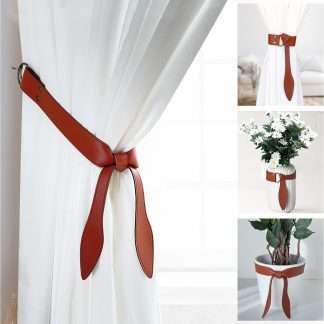 Knotted curtain tiebacks made of super soft brown synthetic leather